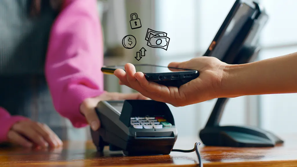 Person uses a payment app on their phone at a card reader.